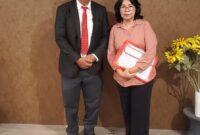 Foto : Kanan Paulina Chrysanti Situmeang, S.H., M.H. & John L Situmorang SH,.MH. Sebelah kiri