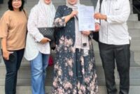 Ketika korban Seusai melaporkan ke Polda metro jaya Di Dampingi Kuasa hukum John L Sitomorang SH MH